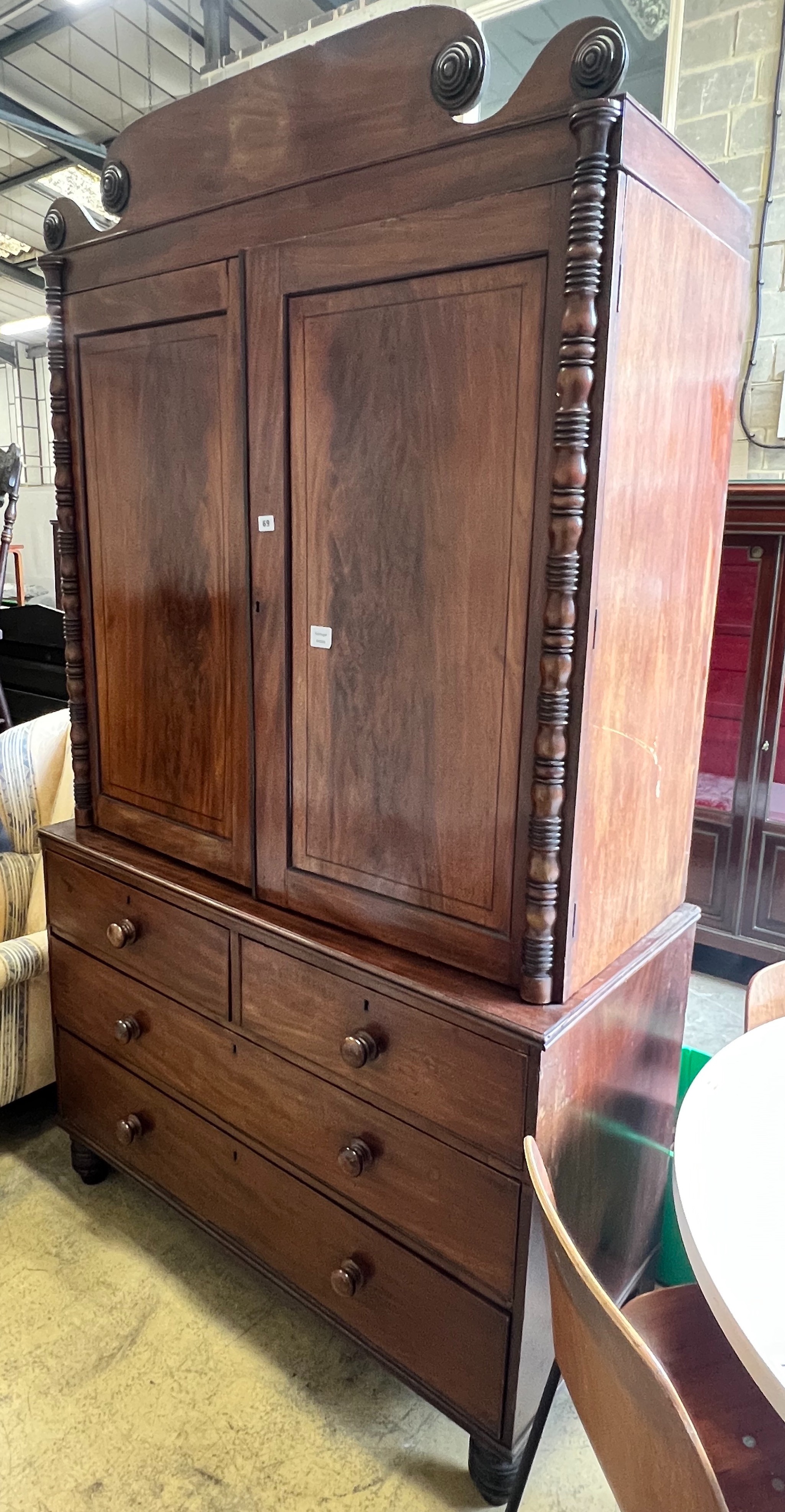 A Regency mahogany linen press, converted to a hanging wardrobe, width 122cm depth 55cm height 216cm